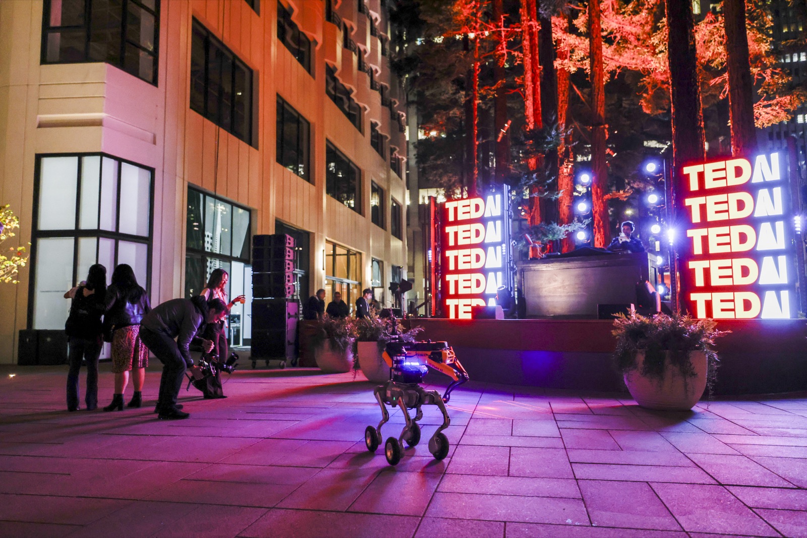 Robot dog walking through the TEDAI evening plaza event